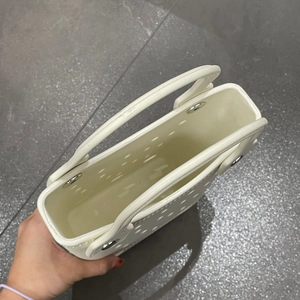 Overhead view showing the spacious interior and white EVA hollow structure of the beach tote