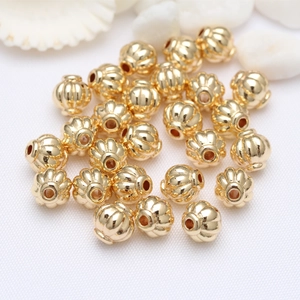 18k gold-plated pumpkin spacer beads for DIY jewelry making with metallic finish