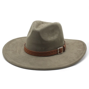 Detailed close-up of dark green suede fedora with brown braided leather belt and silver buckle