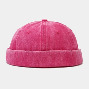 Close-up of vintage washed cotton docker hat in rose red featuring breathable eyelets