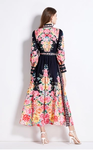 Rear view of long sleeve floral dress showing palace style print and cinched waist belt