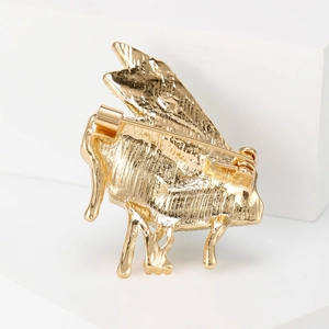 Exquisite gold enamel grand piano brooch with secure pin back on minimalist stand