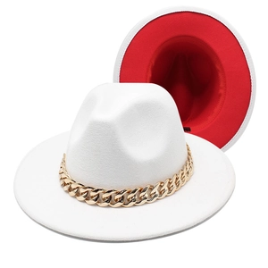 Close-up of bicolor fedora with gold chain detail and contrasting red interior lining