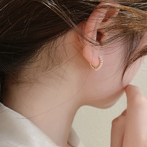 Elegant gold pearl hoop earrings for women featuring minimalist round circle design