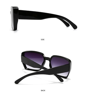 Side and back view of trendy oversized sunglasses with black frame and purple gradient lenses