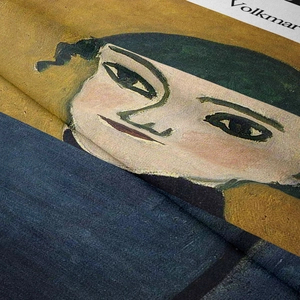 Detail of bohemian tapestry texture showing oil painting style face and canvas weave