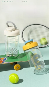 750ml sports shaker bottle featuring volume scale and mixing ball in an athletic scene