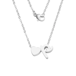 Macro detail of silver heart charm and lowercase letter p pendant on a stainless steel chain