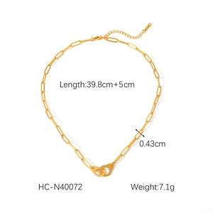 Detail view of gold handcuff pendant necklace with 39.8cm length and 0.43cm chain width