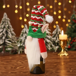 Christmas gnome wine bottle cover with knitted stripe hat and white beard for table decor