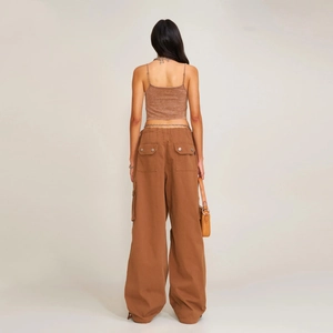 Rear view of brown cotton canvas crop top and multi-pocket cargo pants set