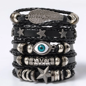 Detail of multi-layer leather bracelets with blue evil eye bead and silver alloy charms