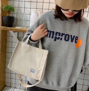 Women's cream corduroy square handbag with adjustable shoulder strap for daily use