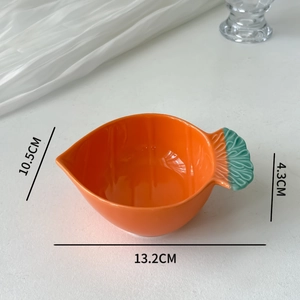 Carrot shaped ceramic sauce dish with detailed size measurements in centimeters