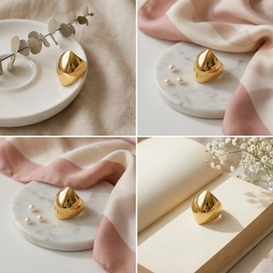 Detailed views of wide gold stainless steel ring on marble and ceramic backgrounds