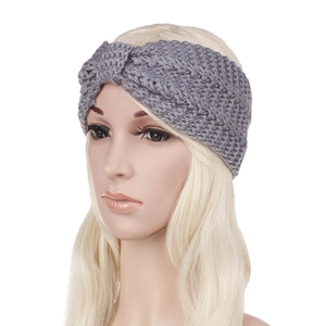 Winter chunky knit headband for women in medium grey with stylish bohemian twisted design