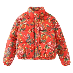 Detailed view of red winter jacket featuring traditional floral and phoenix pattern embroidery