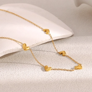 18K gold plated stainless steel O-chain necklace with heart pendants on stone base