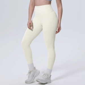 Detailansicht der cremefarbenen Yoga-Leggings mit hohem Bund und nahtlosem Stretch-Material