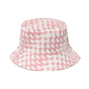 Pink and white reversible fisherman hat with all-over smiley face print for women