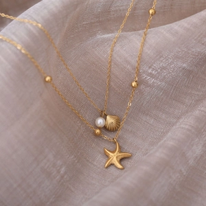Double-layered 18K gold plated starfish and shell necklace with white pearls