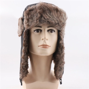 Front view of winter trapper hat with brown faux fur lining and black windproof fabric