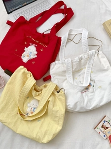 Three large capacity canvas drawstring bags with cute sheep embroidery in red white and yellow