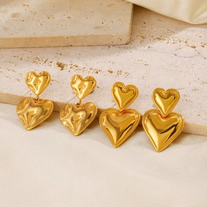 18K gold plated stainless steel heart earrings with hammered and polished finishes