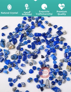 Detailed view of polished irregular blue lapis lazuli natural stone beads with drill holes
