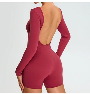 Detail of burgundy long sleeve yoga bodysuit with slim fit open back design