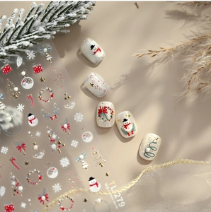 Detailed view of TL-279 embossed Christmas nail stickers with gold relief Christmas trees
