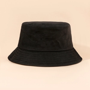 Close-up of black cotton bucket hat showing parallel stitching on wide brim surface
