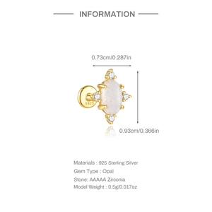 Macro detail of gold-plated S925 silver stud earring with white opal and zirconia