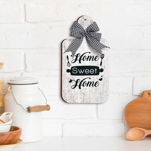 Rustic wood cutting board sign with Home Sweet Home text and black buffalo plaid bow