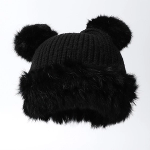 Winter black knit hat with large faux fur pom-poms and thick plush bear ear design