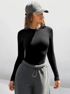 Slim fit Y2K black ribbed long sleeve T-shirt with crew neck on model in studio