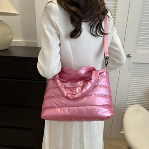 Pink quilted down shoulder bag for women with glossy finish and adjustable strap