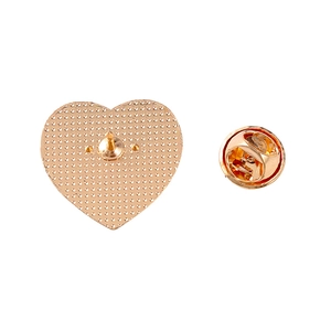Golden heart-shaped metal brooch back with butterfly clasp and anti-slip texture detail
