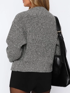 Women's grey chunky knit sweater with long sleeves and round neck back view display