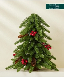 Detailed view of mini Christmas tree with red berries and natural pinecones on a base