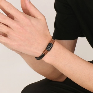 Men's minimalist braided black leather bracelet with matte black stainless steel accents