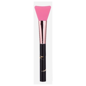 Detail view of pink silicone facial mask brush with rose gold ferrule and marble handle