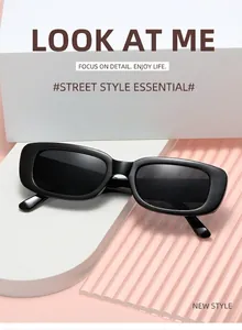 Macro shot of stylish black rectangle sunglasses on minimalist geometric display stand