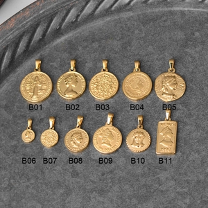 Collection of 11 gold coin pendants featuring Roman figures and Elizabeth II portraits