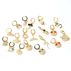 Gold plated hoop earrings with celestial zircon charms including star, moon and emoji motifs