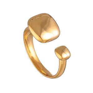 Detail of 18k gold plated stainless steel open ring with square geometric accents