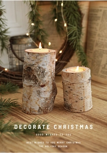 Macro view of birch bark wood candle holders with tea lights for Christmas table decor
