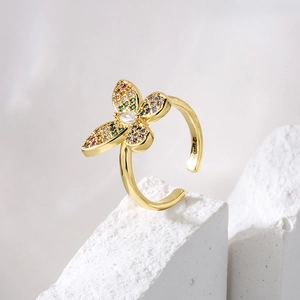 Gold plated open ring with butterfly design and colorful zircon crystals on stones