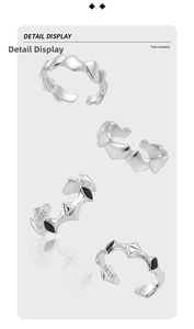 Macro detail of S925 sterling silver ring with black enamel and geometric shapes