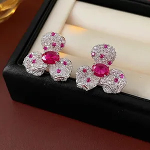 Vintage style floral jewelry set with red zircon stones and white diamond accents